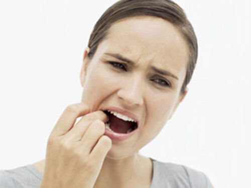 Răng khôn bị đau nhức thường xuyên - Có nên nhổ răng khôn không? 1