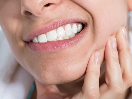 3 dấu hiệu mọc răng khôn cho bạn biết để kiêng cử 1