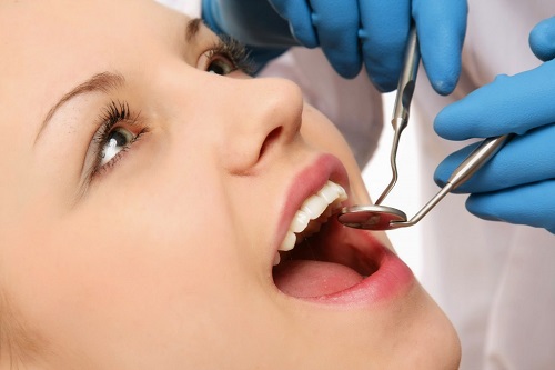 Trồng răng sứ bị nhức nguyên nhân chính do đâu? 2